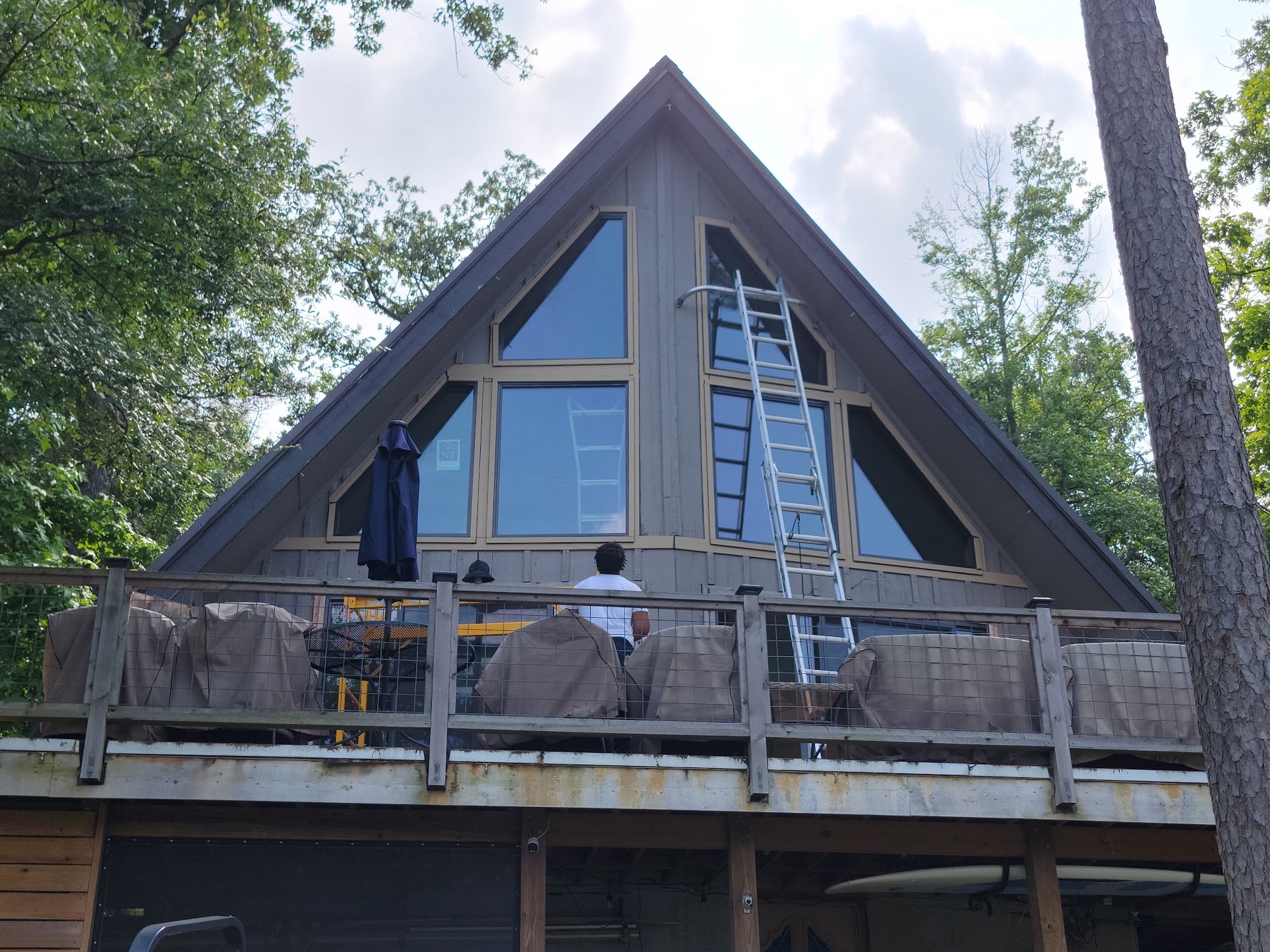 Lakefront A-frame home in The Shores with oversized NT replacement windows