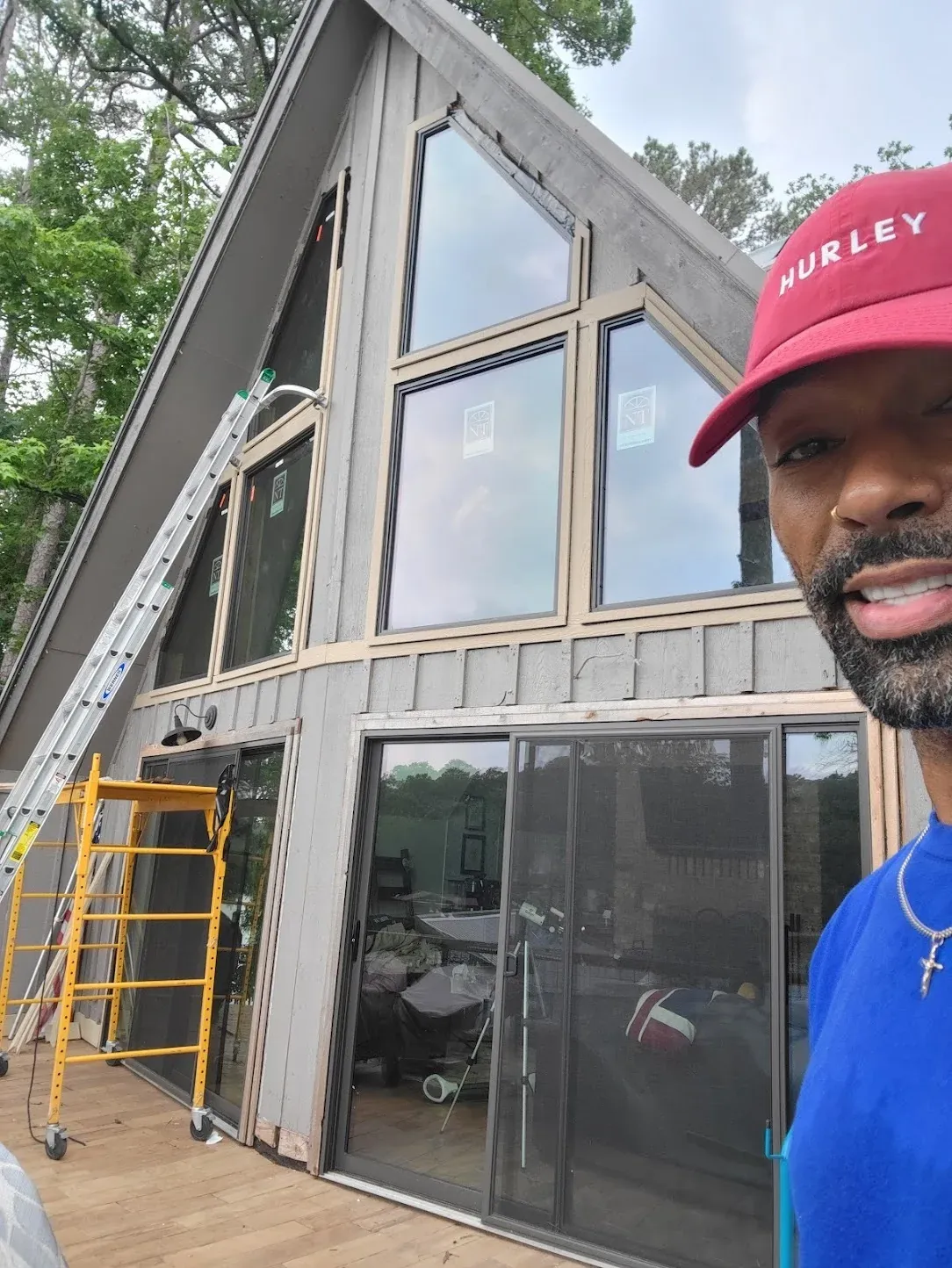 Installer working on Rockwall lakefront window replacement project